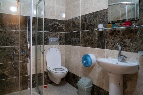 Ένα μπάνιο στο Kuzey Park Hotel