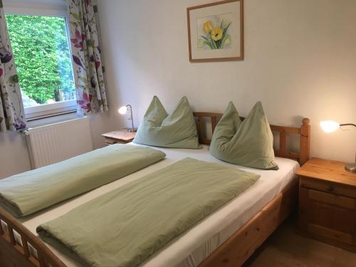 Posteľ alebo postele v izbe v ubytovaní Garten Apartment Diwoky
