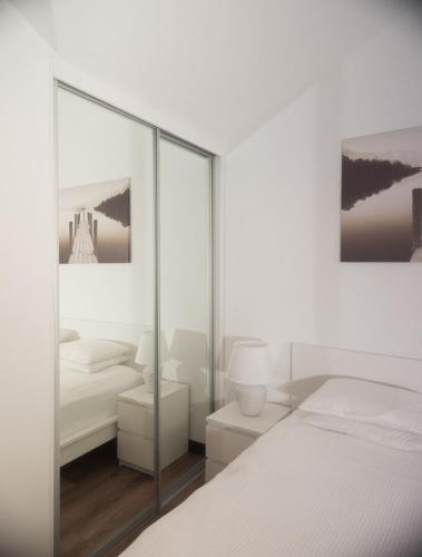Cama o camas de una habitación en Laurentroom Park&Fountain