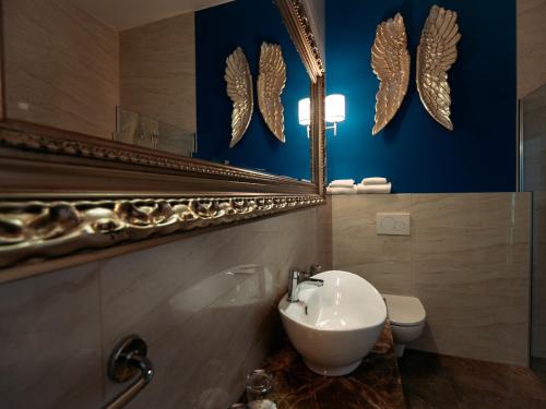 Koupelna v ubytování Boutique Hotel Portorose