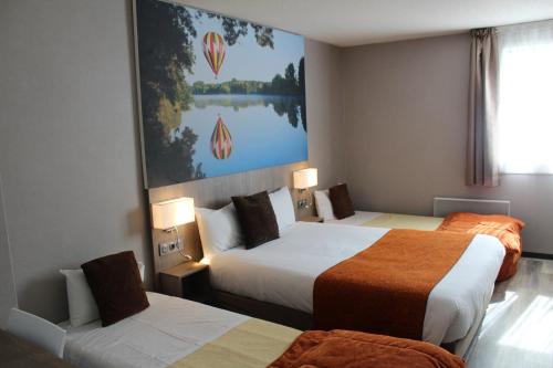 a hotel room with two beds and a large painting on the wall at The Originals City, Hôtel La Terrasse, Tours Nord in Tours