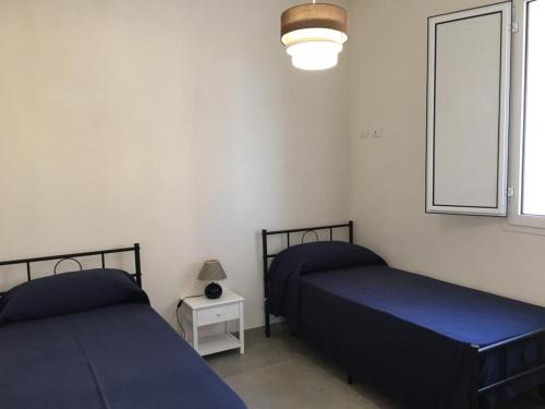 Postel nebo postele na pokoji v ubytování Casa Vigna da Michela