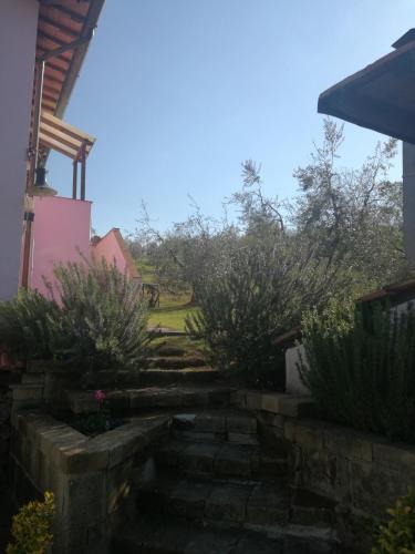 a set of stone stairs leading to a house at Agriturismo Campolungo in Sant'Ermo