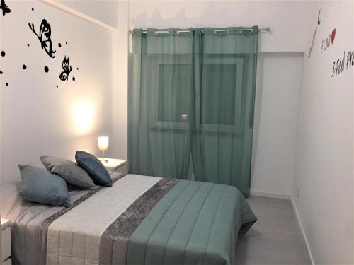 Кровать или кровати в номере Caparica Sol