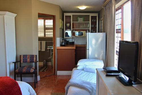 Una cocina o zona de cocina en Walkerbay Accommodation
