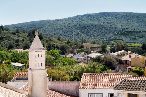 a view of a town from the roof of a building at Alte Tradition Guest House in Alte