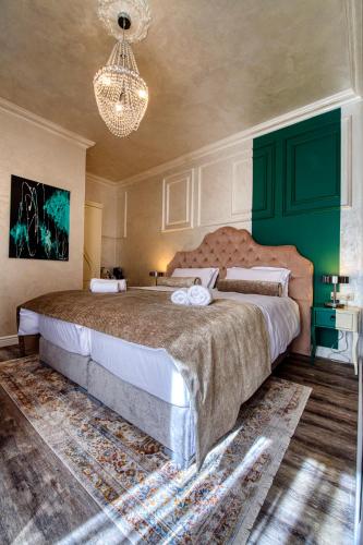 Katil atau katil-katil dalam bilik di Riva Palace - design rooms