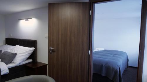 Postel nebo postele na pokoji v ubytování Botel Gracia
