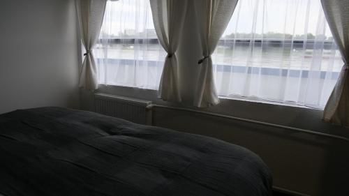 Postel nebo postele na pokoji v ubytování Botel Gracia