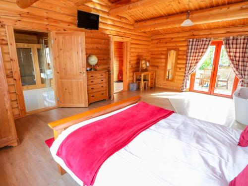 Ένα ή περισσότερα κρεβάτια σε δωμάτιο στο Ash Lodge