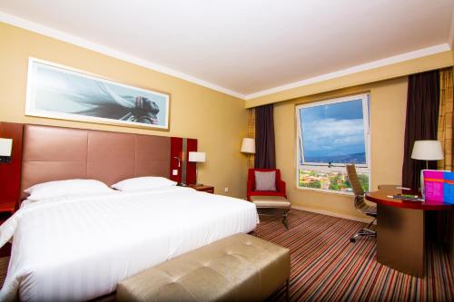 Postel nebo postele na pokoji v ubytování Park Inn by Radisson, Kigali