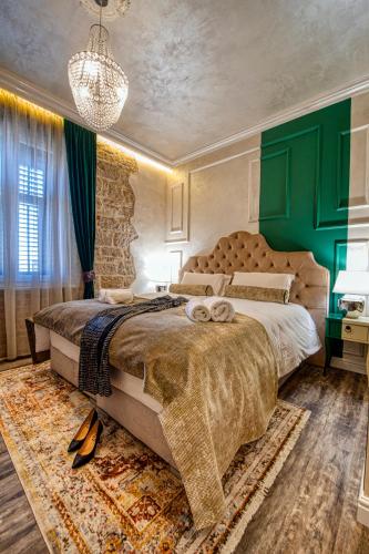 Katil atau katil-katil dalam bilik di Riva Palace - design rooms