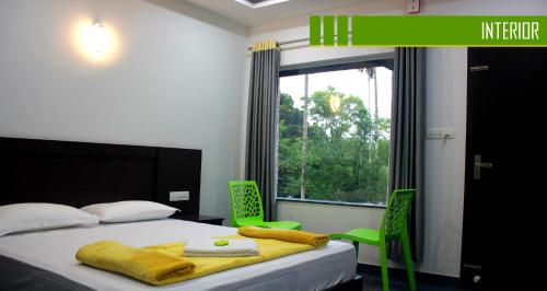 Ένα ή περισσότερα κρεβάτια σε δωμάτιο στο Vintage Garden Resort