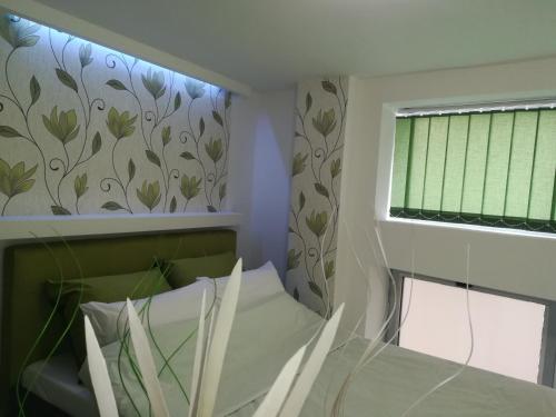 Una cama o camas en una habitación de Classy and Cozy - PARKING - 3 beds - Near Center