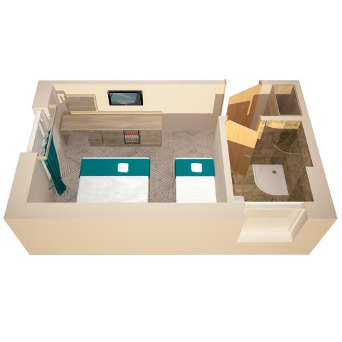a floor plan of a room with two beds at The Lion & Key Hotel in London