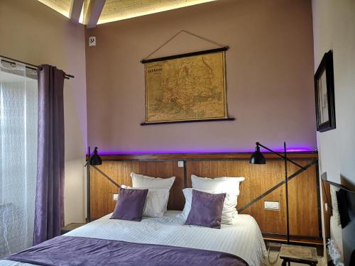Postel nebo postele na pokoji v ubytování Le relais des deux tours