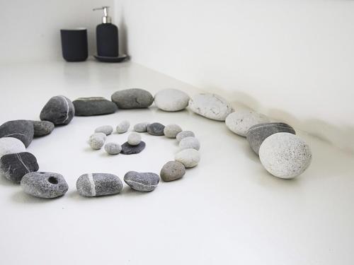 a group of rocks arranged in the shape of a heart at Glan Dwr Bach in Llandegfan