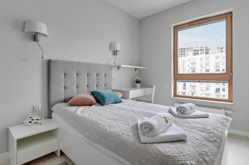 Posteľ alebo postele v izbe v ubytovaní Luxury Voyage Apartments + extra bikes