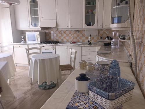Η κουζίνα ή μικρή κουζίνα στο b&b Mundè