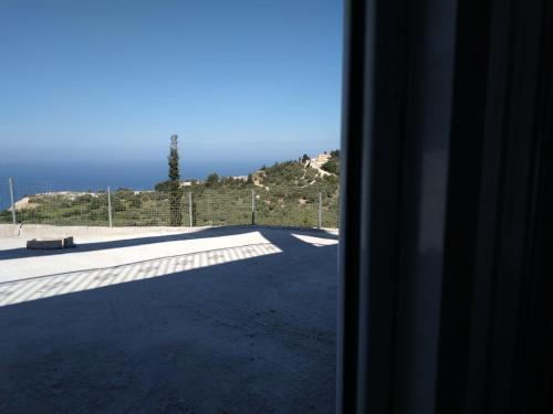 a view of a skate park from a window at Athani Summer House (Apartments 03 - 04) in Athanion