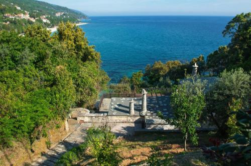 a view of the ocean from a hill at Pelion BNB Luxury homes in Damouchari