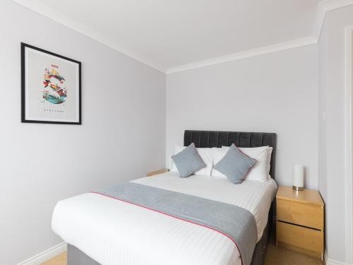 Ένα ή περισσότερα κρεβάτια σε δωμάτιο στο Clydesdale Hotel