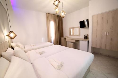 Cama o camas de una habitación en Idi Hotel