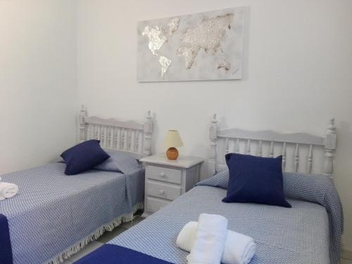 Postel nebo postele na pokoji v ubytování Zeus Montblanc