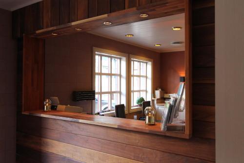 a mirror in front of a doctors office at Fanitullen Hotel in Hemsedal