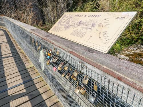 a fence with locks on it with a sign on it at 12 Keathbank Court in Blairgowrie