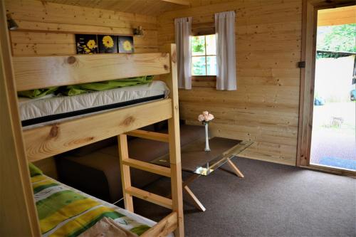 Postel nebo postele na pokoji v ubytování Rekreačná chatka Oliver