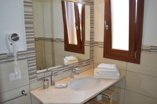 Koupelna v ubytování Guest Rooms Affittacamere