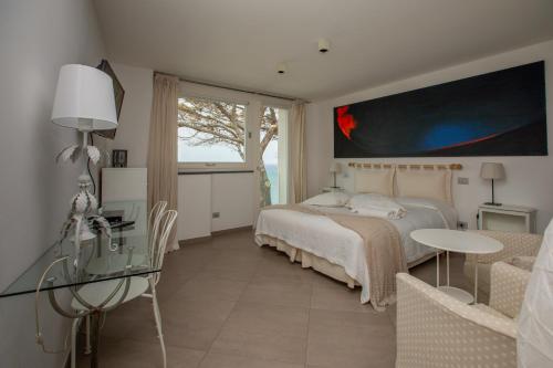 En eller flere senge i et værelse på Il Gabbiano Relais in Stromboli