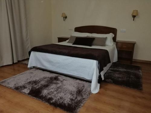 Postel nebo postele na pokoji v ubytování A Vileira