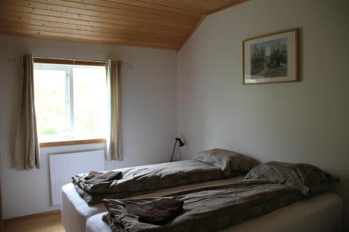 Postel nebo postele na pokoji v ubytování Guesthouse Hof in Vatnsdalur