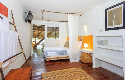 Tempat tidur dalam kamar di Kohsamui Casa Hotel Del Mar