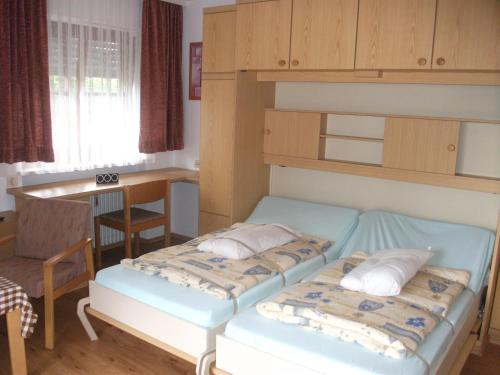 Llit o llits en una habitació de Appartemant Steineberg