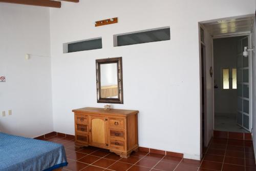 Ένα ή περισσότερα κρεβάτια σε δωμάτιο στο Casa de huéspedes vista hermosa