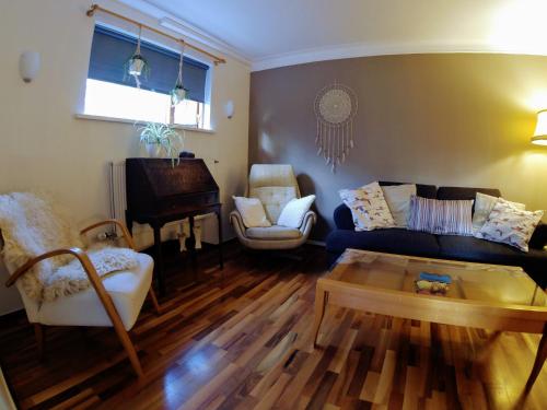 Skjolbraut - Cozy apartment - Central location - Free parking - Close to a public swimming pool and Sky Lagoonにあるシーティングエリア