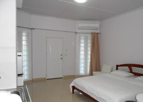 Postel nebo postele na pokoji v ubytování MT-Room