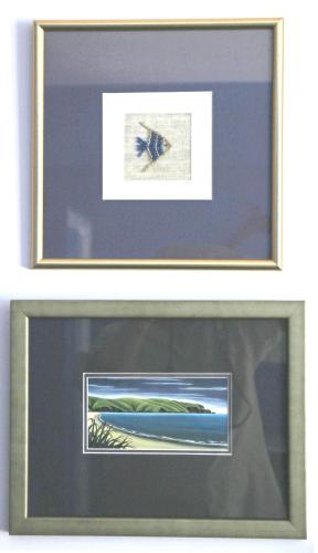 two framed photographs of a bird flying over the ocean at Twin Waters Lodge in Collingwood