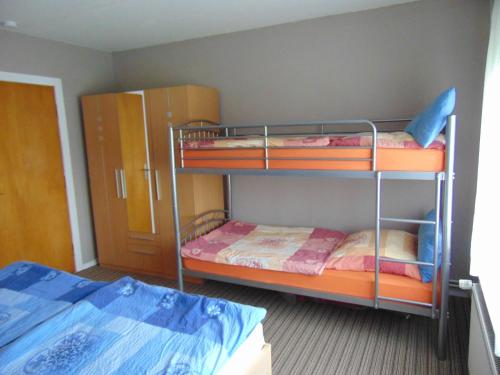 Postel nebo postele na pokoji v ubytování Ferienwohnung Ehrich nahe Otterndorf