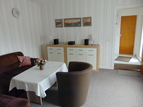 Posezení v ubytování Ferienwohnung Ehrich nahe Otterndorf