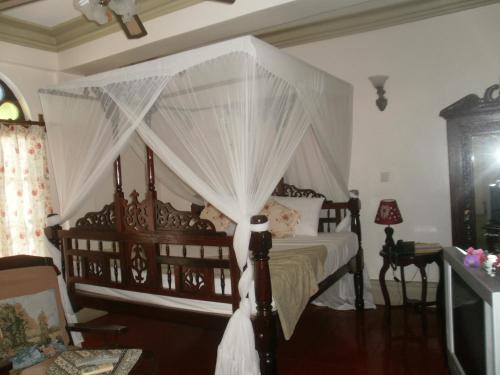Posteľ alebo postele v izbe v ubytovaní Asmini Palace Hotel