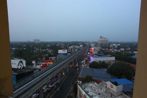 an overhead view of a city with a highway at Laimar Suites in Cochin