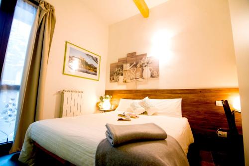 Ένα ή περισσότερα κρεβάτια σε δωμάτιο στο Bed & Breakfast Le Due G
