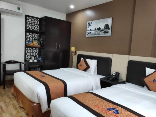Cama o camas de una habitación en Bảo Hân 2 Hotel