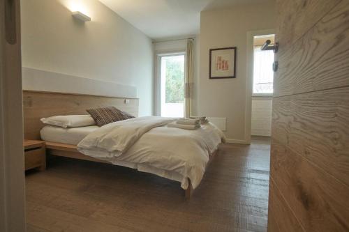 Postel nebo postele na pokoji v ubytování Agriturismo CasaMela