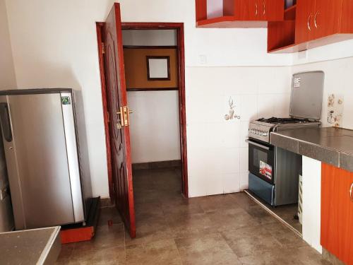 Kuchyň nebo kuchyňský kout v ubytování Merinja Guest House