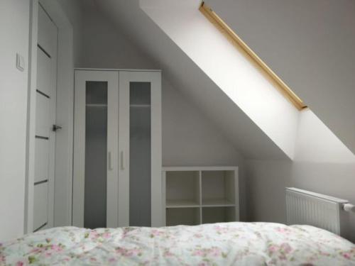 En eller flere senge i et værelse på Sztutowo Apartament Jaś